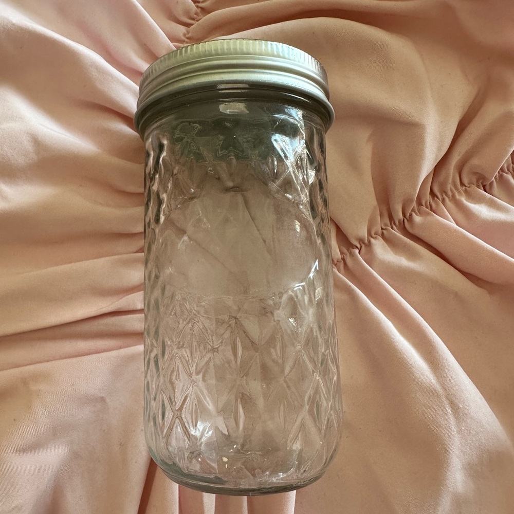 Mason Jar with Straw Cut Out on Lid